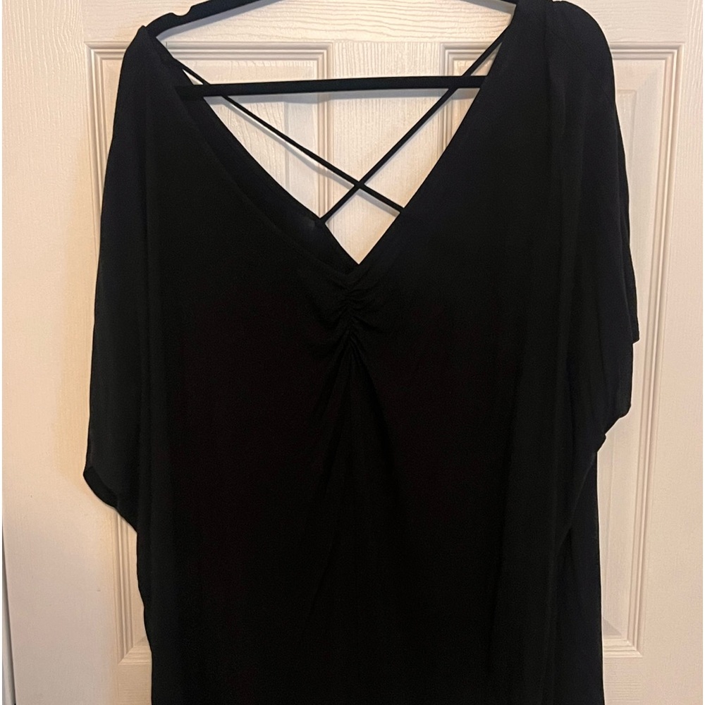 Black top with cute design on back